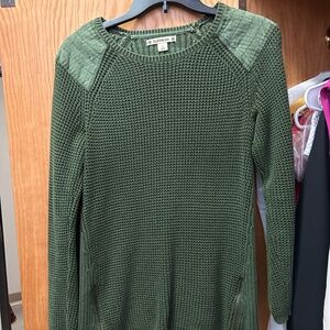 Green cableknit sweater with metal details